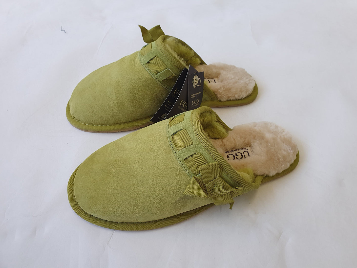 Green slip on ugg slippers
